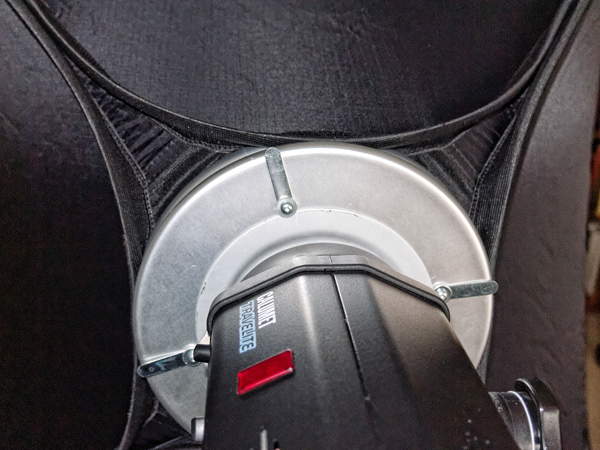 Photograph of mounting plate and adapter ring assembly for Lastolite EZbox 36x36 on a Calumet Bowens Travelite photo studio strobe.